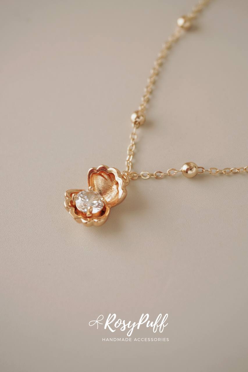 Mermaid's Treasure In Gold